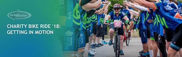 Bike riders congratulating Lyn Beinat upon reaching the final stop