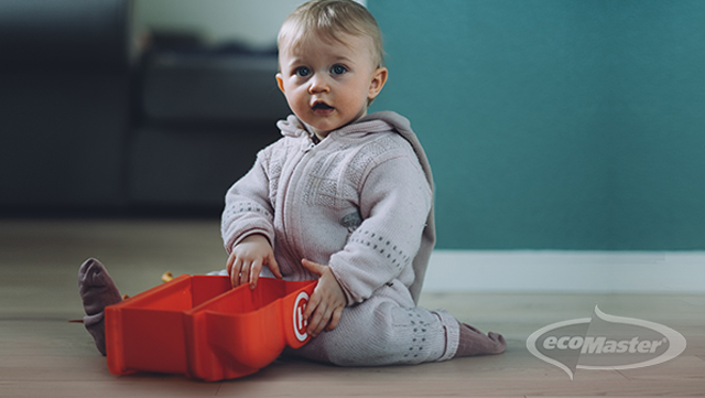 Baby fully covered with winter clothes EcoMaster