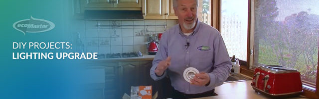 ecoMaster Maurie Beinat holding an LED downlight
